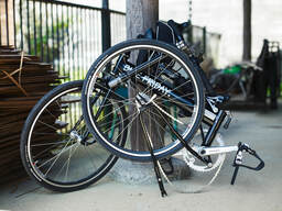 Folding bike next to lamp-post