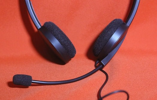 Photograph of headphones with attached microphone